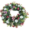Künstlicher Blumenkranz mit Rosen, Gänseblümchen und Disteln in Rosa/Weiß – hochwertige, realistische Ganzjahresdeko, Frontansicht.
